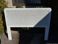 Front view of white wicker queen headboard showing full design and condition
