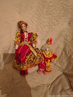 Front view of both dolls showing size and outfits