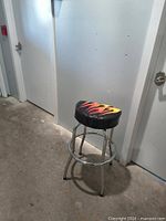 Full view of bar stool against wall