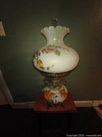 Lamp assembled, showing hand painted glass shade and base