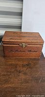 Full view of La Fontana wooden cigar box showing branding and latch