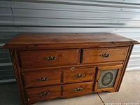 Front view of pine dresser showing drawers and stained glass door