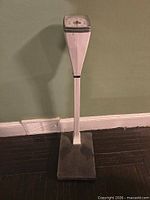 Full view of standing Health o meter scale showing pedestal and platform