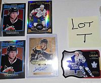 Front views of five hockey cards and lot label