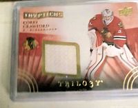 Front of card displaying player image, jersey patch, logos and name