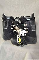 Front and side view of both Burton snowboard boots showing overall design and condition