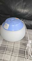 Life branded humidifier full view showing reservoir, top and cord