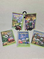 Group shot of five VeggieTales DVDs displayed, showing full cover art