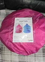 Front view of carry bag with Royal Castle insert showing pink and blue tent options
