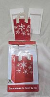 Ceramic snowflake gift bag decor displayed with original box and styrofoam packaging