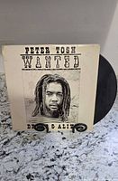 Front cover of Peter Tosh Wanted Dread & Alive LP showing portrait artwork