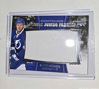 Front of card showing player image, Rookie Jumbo Fabrics title and fabric swatch