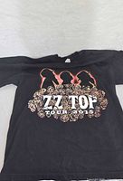 Front view of ZZ Top 2015 concert T-shirt showing graphic and size context