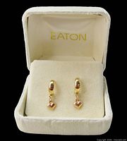 Earrings displayed in Eaton box