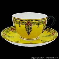 teacup on saucer front view showing pattern and color