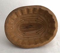 Top view showing oval interior with corn cob relief and glaze condition