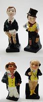 Front view of all four Royal Doulton Dickens miniature figurines