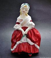 Front view of Royal Doulton Peggy figurine showing full dress detail