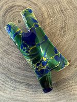 Front view showing abstract form and enamel colours