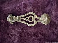 Front view of entire iron window latch fragment