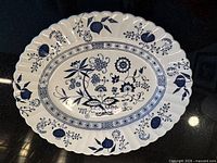 Top view of oval platter showing full Blue Nordic pattern and scalloped rim