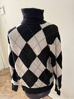 Full back view of argyle cashmere turtleneck sweater