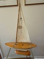 Full view of Star Yacht SB3 sailboat on stand
