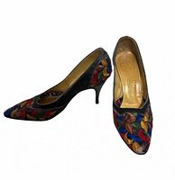 both shoes front view showing embroidery and toe wear