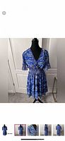 Front view of blue floral Max Studio dress on mannequin