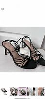Black strappy heeled sandals side and top view