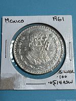 Obverse of 1961 Mexico 1 Peso coin in 2x2 holder
