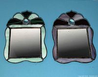Both stained glass mirrors front view