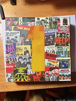 Front of puzzle box showing Beatles collage artwork