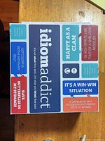 Front of Idiom Addict sealed game box