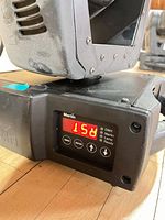 Close-up of DMX control panel showing power-on state