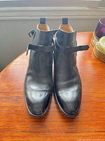 Front view of both boots showing overall condition