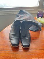 front view of both boots standing on table