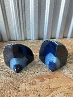 Front view of both agate halves showing polished blue faces