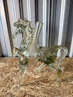 Full view of glass horse decanter standing on rear legs