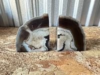 Pair of agate bookends standing together showing inner polished faces