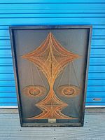 Front view of framed string art