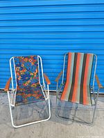 Both folding chairs together showing overall condition and patterns