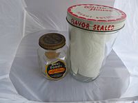 Both vintage jars side by side showing sizes and lids