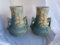 Front view of both Roseville Clematis vases showing design and color