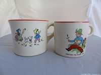 Front view showing both illustrated cups and graphics