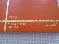 Red album cover titled “Stamp of India Delhi-51” with gold lettering