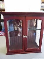 Front view showing two glass doors and overall size