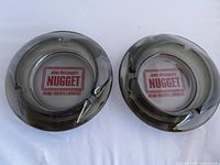 Top view of both ashtrays showing logo and rests