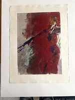 Full sheet view showing artwork and deckled edges