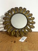 Front view showing full sunburst mirror